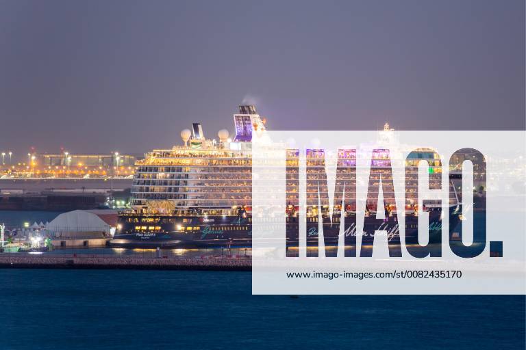 DOHA, QATAR – MARCH 14, 2018: The Mein Schiff 5 cruise ship lit at night. Marina Lystseva TASS TS078D50