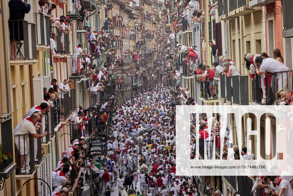 People take part in the traditional encierro (bull-run) of the San Fermin Festival in Pamplona, Spain on July 07, 2025. The bull-running fiesta is held annually from 06 to 14 July in commemoration of the city s patron saint. Visitors from all over the world attend the festival. Many of them physically participate in the highlight event - the running of the bulls, or encierro - where they attempt to outrun the animals along a route through the narrow streets of Pamplona s old city. Pamplona Spain - ZUMAa206 20250707_zsp_a206_010