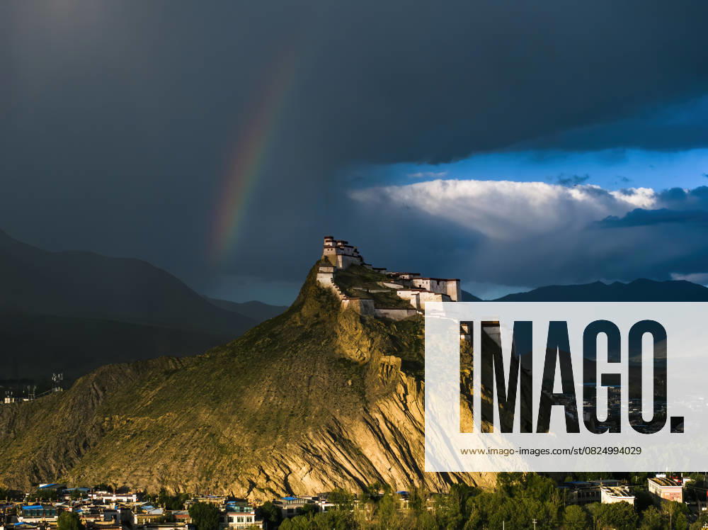 KW28 SHIGATSE, CHINA - JULY 09: Aerial view of rainbow appearing over Jiangzi Zongshan Castle after a rain on July 9, 2025 in Shigatse, Xizang Autonomous Region of China.