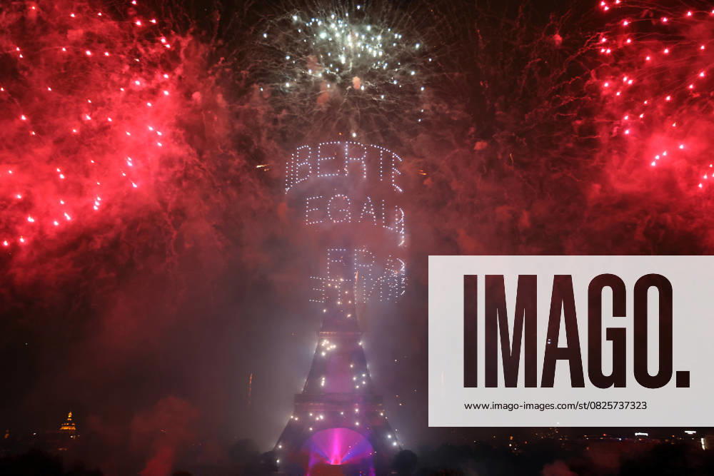 Fireworks and drones light the Eiffel Tower during the Bastille Day celebrations in Paris, France, on Monday, July 14, 2025. French cities increasingly turn to drone light shows, prioritizing environmental safety over traditional fireworks that risk sparking wildfires in drought-prone areas. PAR20250714212 MAYAxVIDON-WHITE