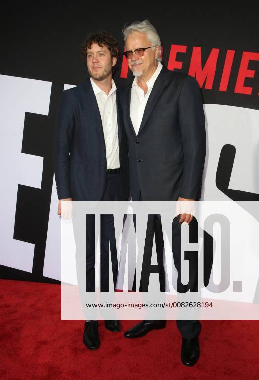 WESTWOOD, CA - APRIL 3: Jack Henry Robbins and Tim Robbins at the Blockers film premiere at the Regency Village Theatre in Westwood, California on April 3, 2018.