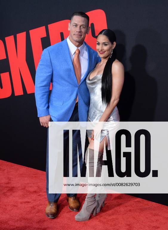 Cast member John Cena (L) and his wife, wrestler Nikki Bella attend the premiere of the motion picture comedy Blockers at the Regency Village Theatre in the Westwood section of Los Angeles on April3, 2018. Storyline: Three parents try to stop their daughters from having sex on Prom night. LAP2018040353 JIMxRUYMEN
