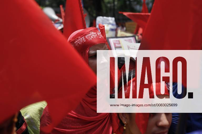 Dhaka, Bangladesh - A garment worker looks on as she attends a procession to mark May Day or International Workers Day in Dhaka. Dhaka Bangladesh - ZUMAh143 20180430_zap_h143_014