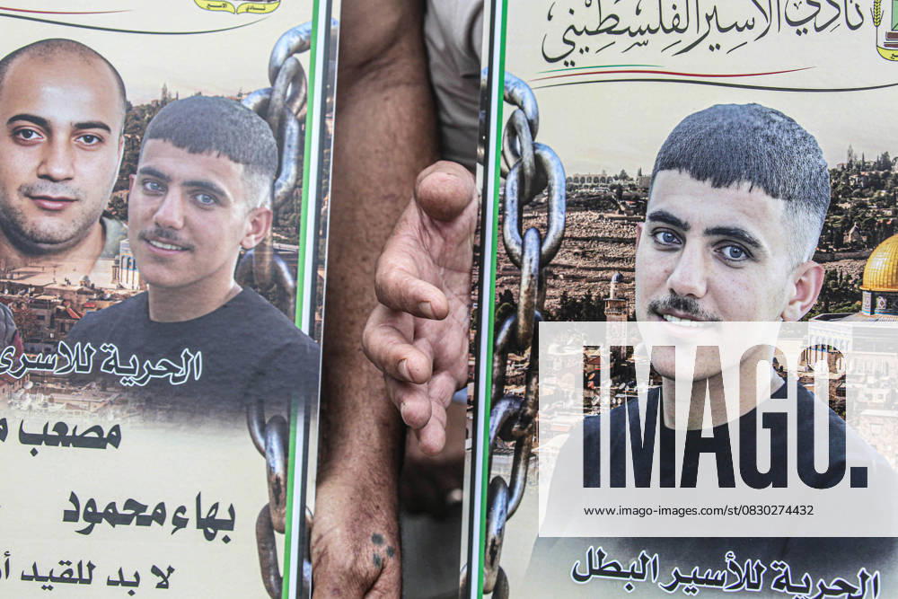 Portraits of Palestinian prisoners are seen during a solidarity rally demanding a prisoner exchange agreement between the Israeli government and Hamas. Nablus Palestine - ZUMAs197 20250812_aaa_s197_048