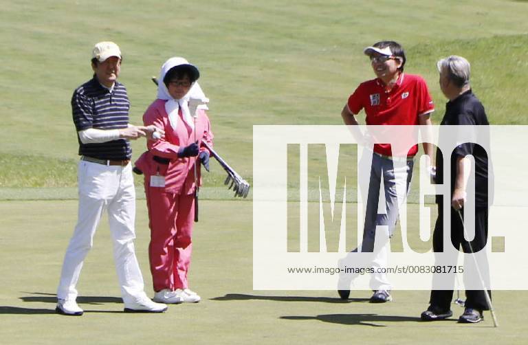 Japan PM Abe Japanese Prime Minister Shinzo Abe (far L) is pictured while playing golf in Fujikawaguchiko, Yamanashi Prefecture, central Japan, on May 6, 2018.