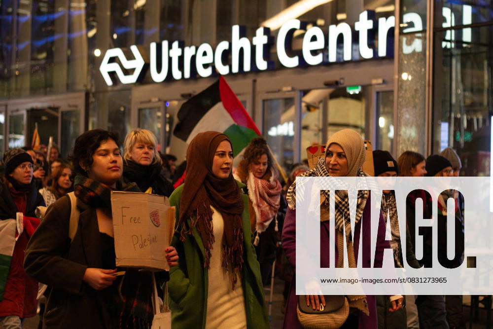 Pro-Palestinian protest in Netherlands UTRECHT, NETHERLANDS - JANUARY 18: People, holding banners and Palestinian flags, stage a protest in support of Palestine at the central train station in Utrecht, Netherlands on January 18, 2024. Sit-ins in solidarity with Palestine were organized at major train stations in different cities across the Netherlands. Netherlands World. Editorial use only. Please get in touch for any other usage.
