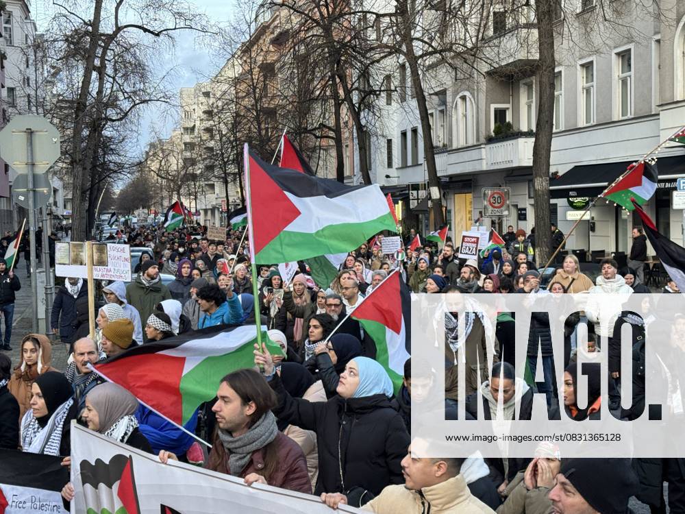 Pro-Palestinian protest in Berlin BERLIN, GERMANY - DECEMBER 30: People stage a protest against Israeli attacks on Gaza and show solidarity with Palestinians at Adenauerplatz Square in Berlin, Germany on December 30, 2023. Approximately 1200 people attended the demonstration, where participants expressed their support for Palestinians and protested against Israel s attacks on Gaza. Berlin Germany. Editorial use only. Please get in touch for any other usage.