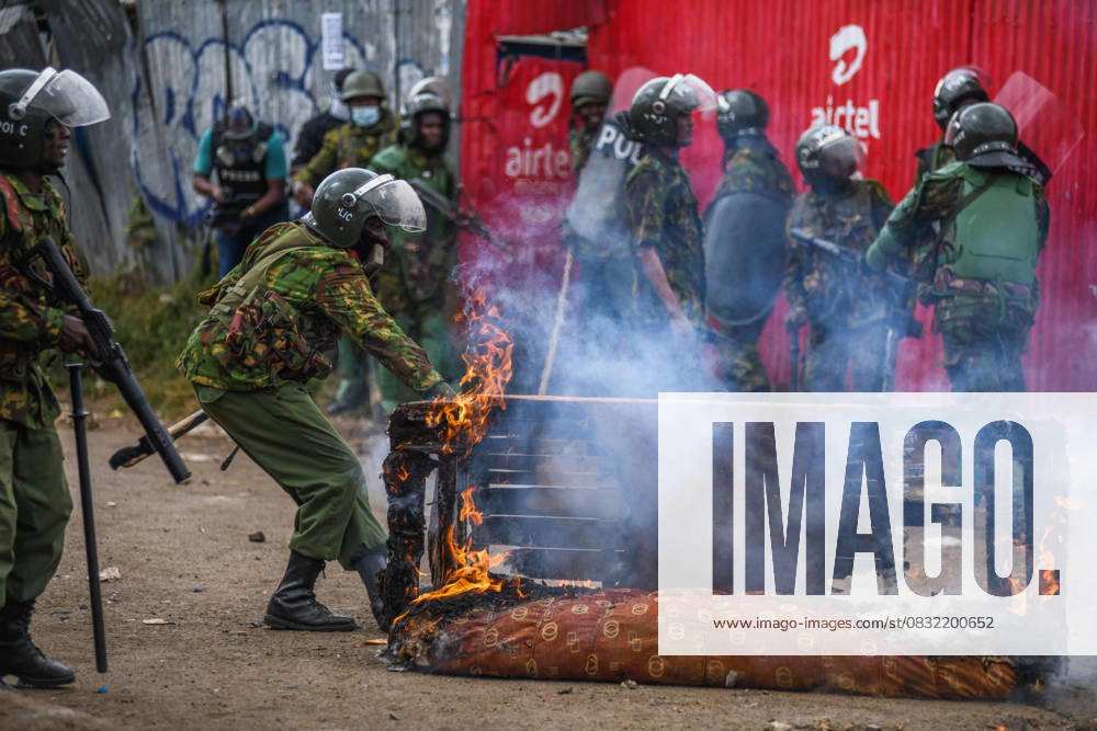 Demonstration against high cost of living in Kenyan capital Nairobi NAIROBI, KENYA - JULY 19: Police try to extinguish a sofa on fire during demonstration held against the rising cost of living, in Nairobi, Kenya on July 19, 2023. Police used tear gas against the demonstrators. Nayrobi Kenya. Editorial use only. Please get in touch for any other usage.