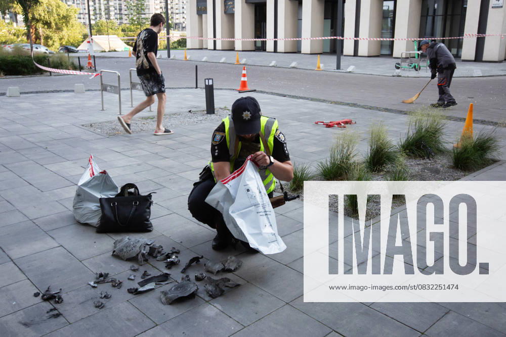 Russian drone attack in residential building of Kyiv KYIV, UKRAINE - JULY 13: A Ukrainian police officer inspects the fragments in front of the damaged residential building after Russian drone attack in Kyiv, Ukraine amid Russia-Ukraine war on July 13, 2023. Ukraine World. Editorial use only. Please get in touch for any other usage.
