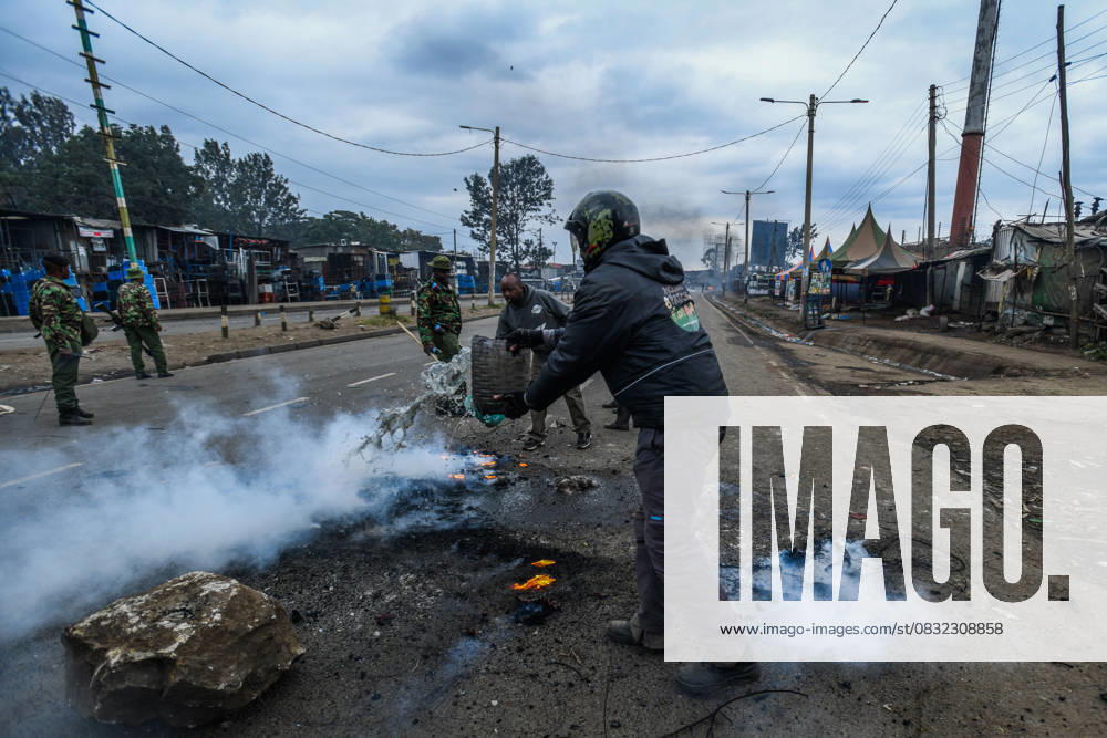 Demonstration against high cost of living in Kenyan capital NAIROBI, KENYA - JULY 07: People take part in a demonstration held against the rising cost of living, in Nairobi, Kenya on July 07, 2023. Personnel tried to ignite the fire lit by the protesters. Nayrobi Kenya. Editorial use only. Please get in touch for any other usage.