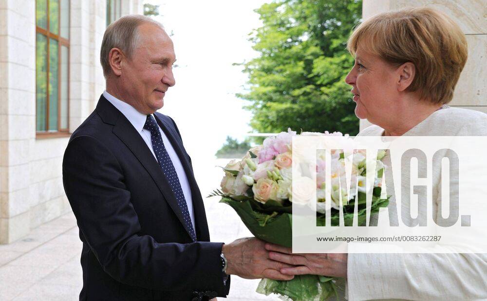 Sochi, Russia - Russian President Vladimir Putin welcomes German Chancellor Angela Merkel to the Bocharov Ruchei residence May 18, 2018 in Sochi, Russia. Sochi Russia - ZUMAp138 20180518_zaa_p138_004