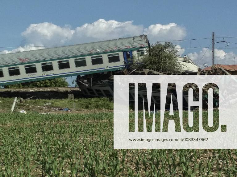 Caluso, Italy - A regional train plowed into a rig truck that had stopped on the tracks in Caluso, outside Turin. Two people were killed and 20 others injured in the train crash. The incident occurred late on May 23rd when the train hit a large truck that had stopped on the tracks. Caluso Italy - ZUMAg210 20180524_zbp_g210_045