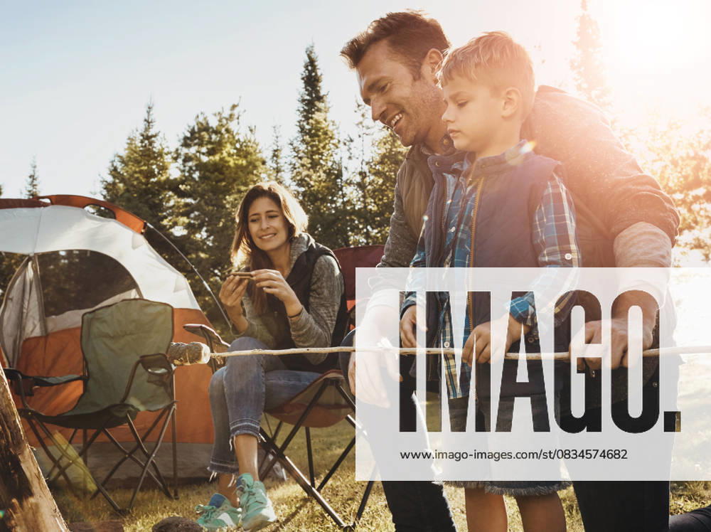 Family, camping and smores outdoor in nature for bonding with love, happiness and relax in forest with affection. Mother, father and son together for adventure in wilderness, peace and summer trip. Family, camping and smores outdoor in nature for bonding with love, happiness and relax in forest with affection. Mother, father and son together for adventure in wilderness, peace and summer trip, model released, , 60670208.jpg RECORD DATE NOT STATED