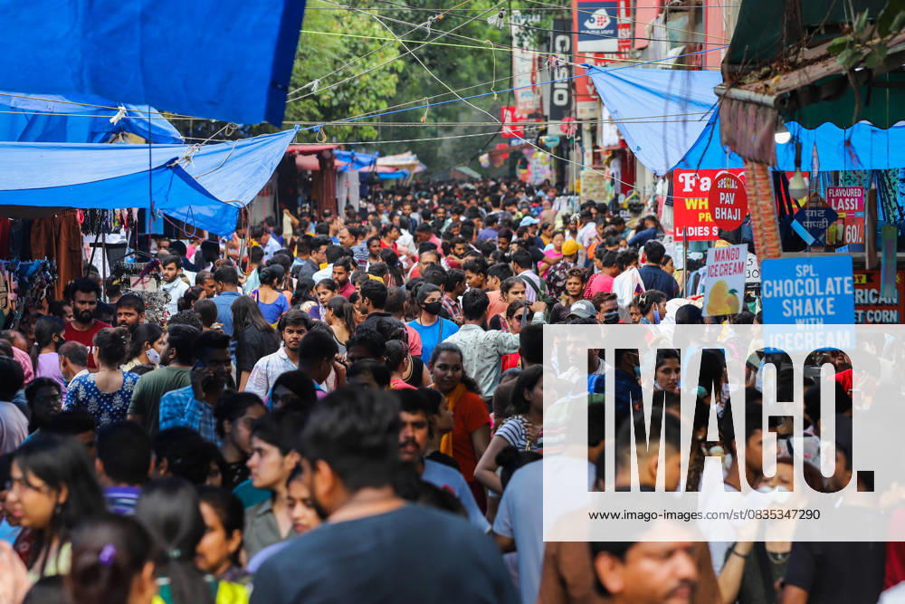 World Population Day in New Delhi, India NEW DELHI, INDIA - JULY 10: People shop at a crowded market place on the eve of World Population Day in New Delhi, India on July 10, 2022. World Population Day is an annual event, observed on July 11 every year, which seeks to raise awareness of global population issues. Delhi India. Editorial use only. Please get in touch for any other usage.