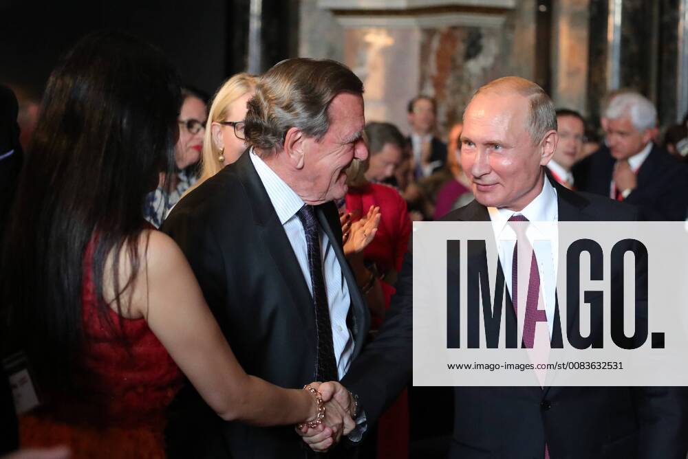 Former Chancellor of the Federal Republic of Germany, Chairman of the Shareholders†Committee at Nord Stream AG, Gerhard Schroder (C front), and Russia s President Vladimir Putin (R) at an exhibition of paintings by old masters from the collections of St Petersburg s State Hermitage Museum at Vienna s Kunsthistorisches Museum. Mikhail Klimentyev Russian Presidential Press and Information Office TASS TS082BE9