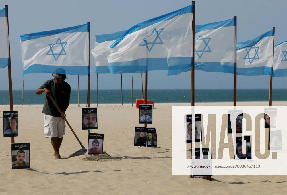 Rio de Paz, a Brazilian human rights NGO known for its symbolic public demonstrations installed 22 Israeli flags and photos of 48 hostages on Copacabana Beach in a demonstration against terrorism and in solidarity with the victims of the Hamas attack on October 7, 2023, marking two years since the attacks on Israel. The act denounced terrorism and called for the release of hostages still held in Gaza. Rio De Janeiro Brazil - ZUMAk251 20251007_znp_k251_003