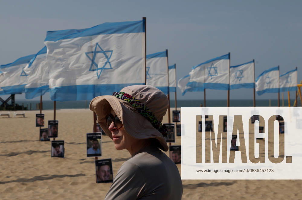 Rio de Paz, a Brazilian human rights NGO known for its symbolic public demonstrations installed 22 Israeli flags and photos of 48 hostages on Copacabana Beach in a demonstration against terrorism and in solidarity with the victims of the Hamas attack on October 7, 2023, marking two years since the attacks on Israel. The act denounced terrorism and called for the release of hostages still held in Gaza. Rio De Janeiro Brazil - ZUMAk251 20251007_znp_k251_009