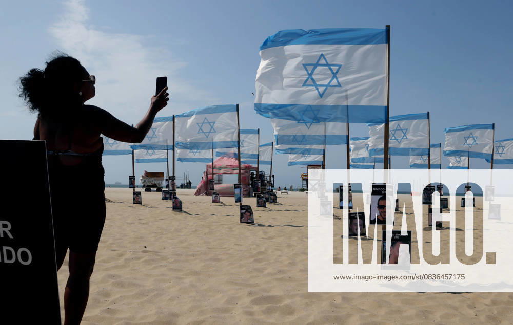 Rio de Paz, a Brazilian human rights NGO known for its symbolic public demonstrations installed 22 Israeli flags and photos of 48 hostages on Copacabana Beach in a demonstration against terrorism and in solidarity with the victims of the Hamas attack on October 7, 2023, marking two years since the attacks on Israel. The act denounced terrorism and called for the release of hostages still held in Gaza. Rio De Janeiro Brazil - ZUMAk251 20251007_znp_k251_014