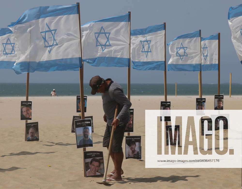 Rio de Paz, a Brazilian human rights NGO known for its symbolic public demonstrations installed 22 Israeli flags and photos of 48 hostages on Copacabana Beach in a demonstration against terrorism and in solidarity with the victims of the Hamas attack on October 7, 2023, marking two years since the attacks on Israel. The act denounced terrorism and called for the release of hostages still held in Gaza. Rio De Janeiro Brazil - ZUMAk251 20251007_znp_k251_015