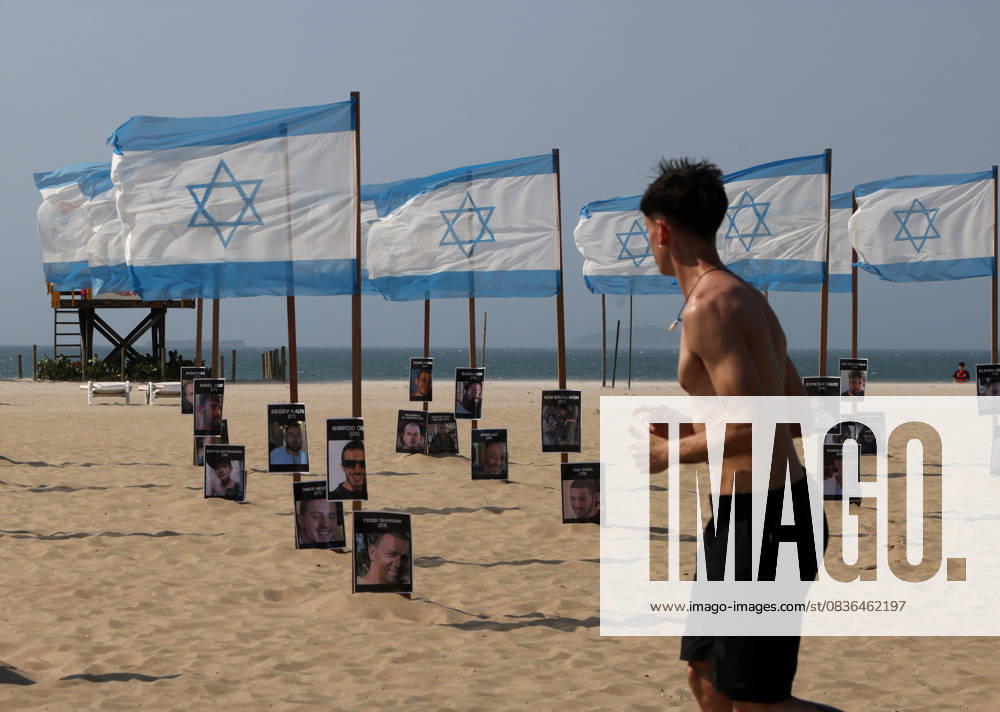 Rio de Paz, a Brazilian human rights NGO known for its symbolic public demonstrations installed 22 Israeli flags and photos of 48 hostages on Copacabana Beach in a demonstration against terrorism and in solidarity with the victims of the Hamas attack on October 7, 2023, marking two years since the attacks on Israel. The act denounced terrorism and called for the release of hostages still held in Gaza. Rio De Janeiro Brazil - ZUMAk251 20251007_znp_k251_001