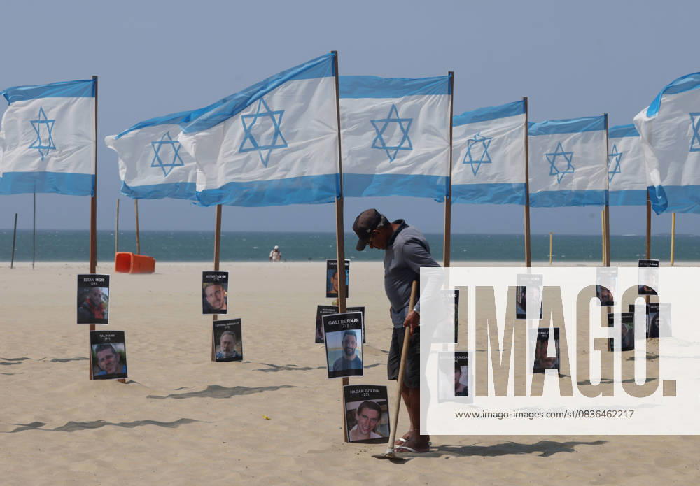 Rio de Paz, a Brazilian human rights NGO known for its symbolic public demonstrations installed 22 Israeli flags and photos of 48 hostages on Copacabana Beach in a demonstration against terrorism and in solidarity with the victims of the Hamas attack on October 7, 2023, marking two years since the attacks on Israel. The act denounced terrorism and called for the release of hostages still held in Gaza. Rio De Janeiro Brazil - ZUMAk251 20251007_znp_k251_005
