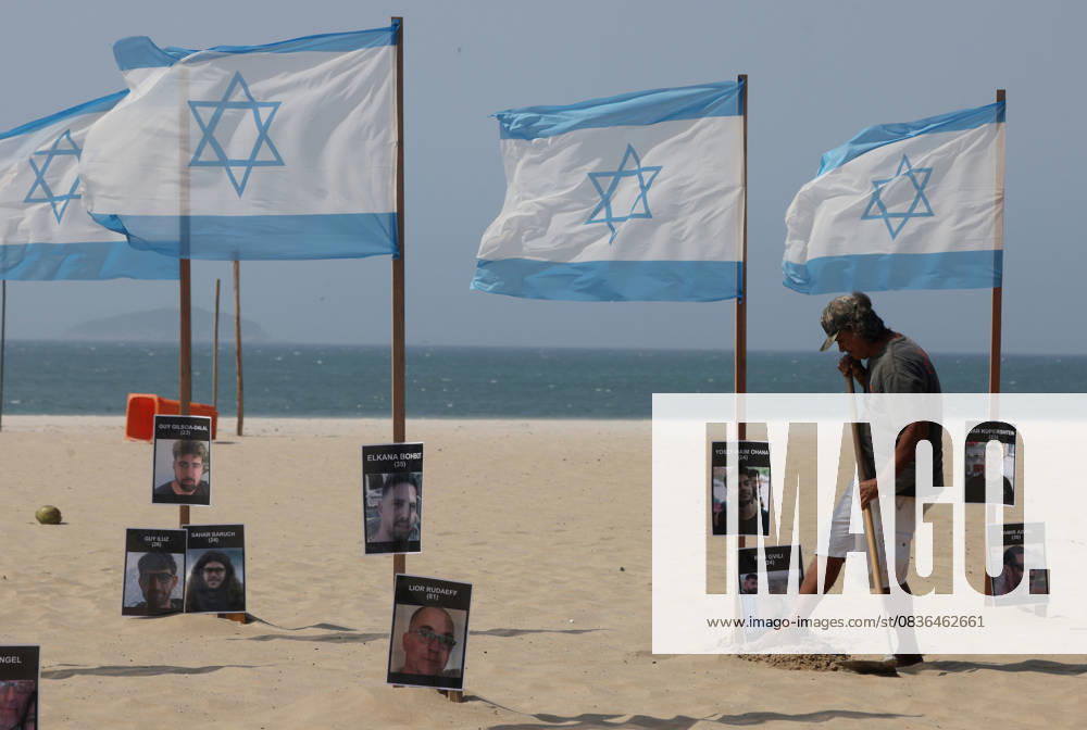 Rio de Paz, a Brazilian human rights NGO known for its symbolic public demonstrations installed 22 Israeli flags and photos of 48 hostages on Copacabana Beach in a demonstration against terrorism and in solidarity with the victims of the Hamas attack on October 7, 2023, marking two years since the attacks on Israel. The act denounced terrorism and called for the release of hostages still held in Gaza. Rio De Janeiro Brazil - ZUMAk251 20251007_znp_k251_013