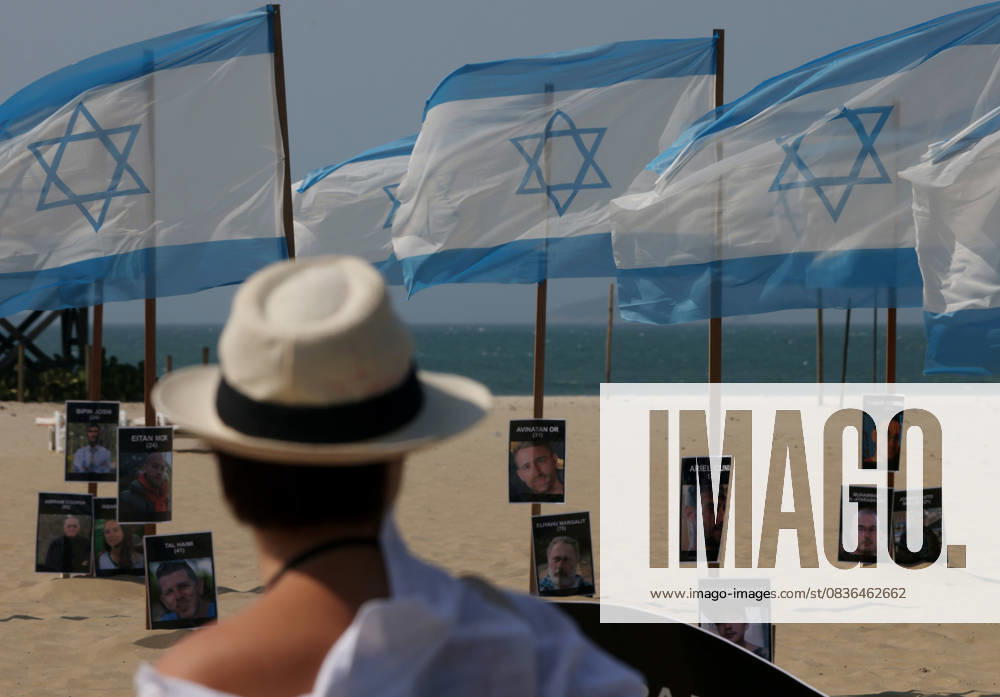 Rio de Paz, a Brazilian human rights NGO known for its symbolic public demonstrations installed 22 Israeli flags and photos of 48 hostages on Copacabana Beach in a demonstration against terrorism and in solidarity with the victims of the Hamas attack on October 7, 2023, marking two years since the attacks on Israel. The act denounced terrorism and called for the release of hostages still held in Gaza. Rio De Janeiro Brazil - ZUMAk251 20251007_znp_k251_016