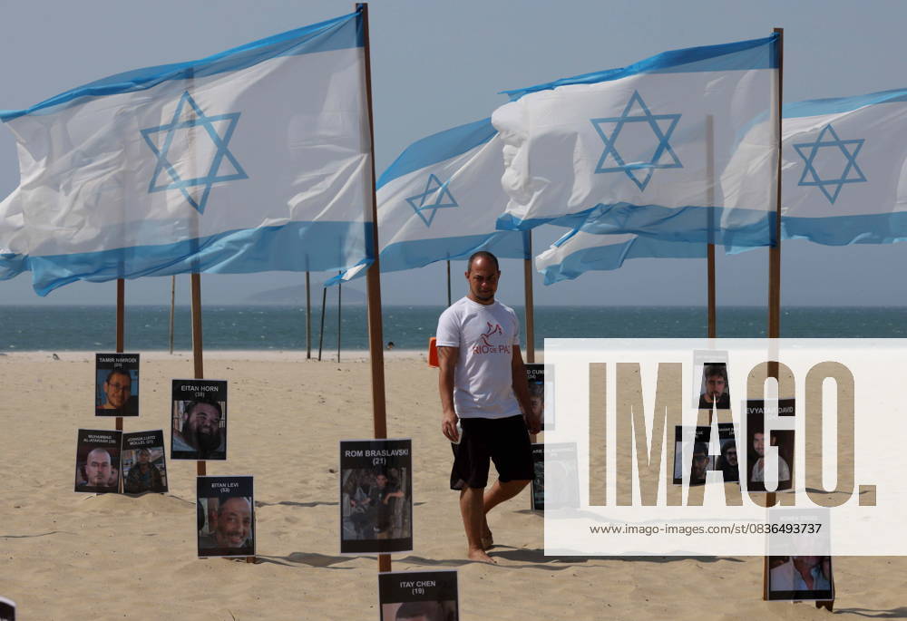 Rio de Paz, a Brazilian human rights NGO known for its symbolic public demonstrations installed 22 Israeli flags and photos of 48 hostages on Copacabana Beach in a demonstration against terrorism and in solidarity with the victims of the Hamas attack on October 7, 2023, marking two years since the attacks on Israel. The act denounced terrorism and called for the release of hostages still held in Gaza. Rio De Janeiro Brazil - ZUMAo Pr 20251007_znp_k251_011