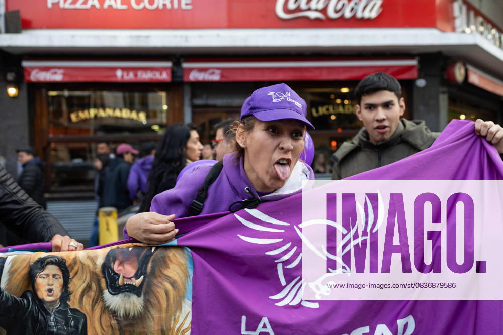 A Javier Milei supporter mocks anti-government protesters during the Argentine presidentÃ¢â‚¬â ¢s new book launch at Movistar Arena. Buenos Aires Argentina - ZUMAp265 20251006_zip_p265_001