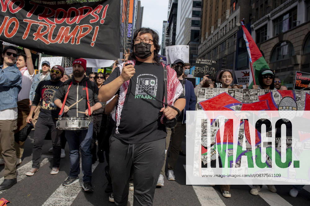 Protesters march down Broadway during the â€oeNo Kings†rally in New York, Saturday, Oct. 18, 2025. The demonstration began in Times Square and ended in Union Square, drawing an estimated 50,000 people who joined others across the country calling for the protection of democratic institutions and denouncing authoritarian leadership. Organizers said more than 5 million people participated in over 2,000 marches nationwide. New York USA - ZUMAa306 20251018_znp_a306_010