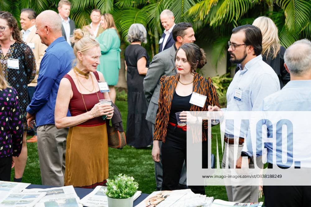Tampa Bay Times staffers and guests mingle with each other during the annual Cocktails and News fundraiser event on Thursday, Oct. 23, 2025, in St. Petersburg. St. Petersburg USA - ZUMAs70_ 20251023_zan_s70_081