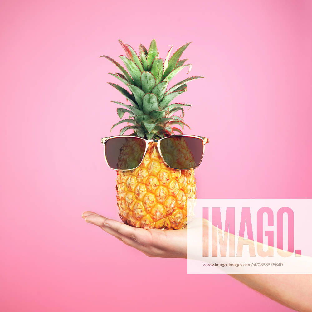 Fruit, sunglasses and pineapple in hand of person on studio, pink background and mockup space. Party, food and offer cool snack in summer for nutrition, diet and wellness benefits from vitamin c Fruit, sunglasses and pineapple in hand of person on studio, pink background and mockup space. Party, food and offer cool snack in summer for nutrition, diet and wellness benefits from vitamin c., model released, , 59428642.jpg RECORD DATE NOT STATED
