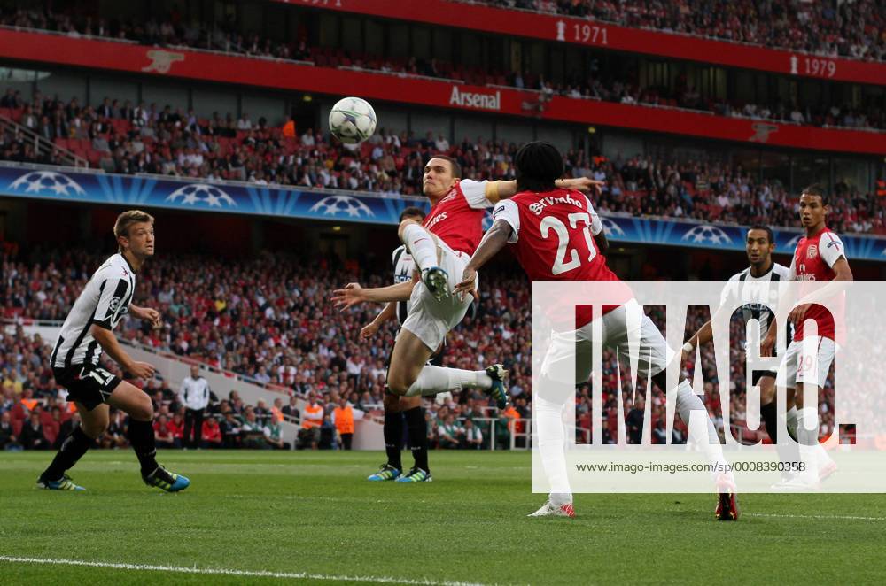 Arsenals Thomas Vermaelen has a shot on target UEFA Champions League Qualifying Arsenal FC London vs Udinese Calcio 16th August, 2011 .