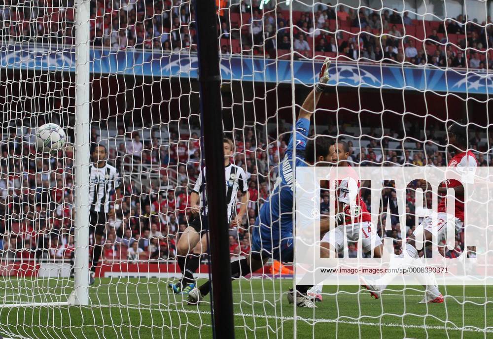 Arsenals Theo Walcott scoring his sides opening goal UEFA Champions League Qualifying Arsenal FC London vs Udinese Calcio 16th August, 2011 .