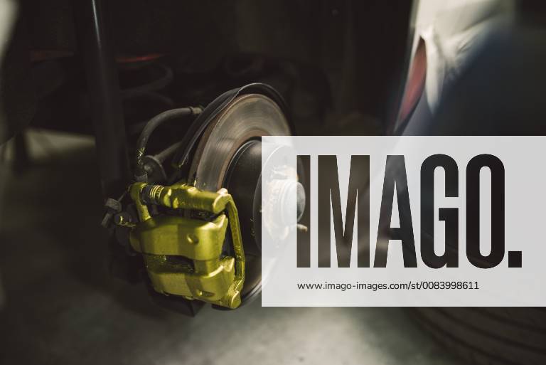 Detail of a disc and brake caliper of a car property released RAEF02002