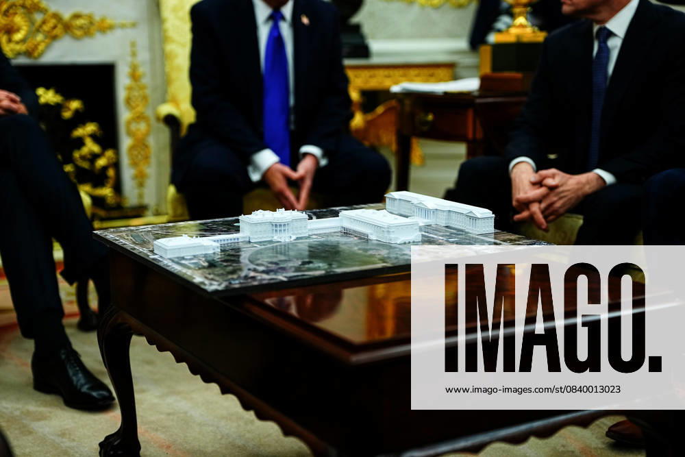 Trump Meets Rutte of NATO in the Oval Office Model of the White House with the new ballroom on the table as United States President Donald J Trump meets Mark Rutte, Secretary General of the North Atlantic Treaty Organization (NATO) in the Oval Office of the White House in Washington, DC, USA, on Wednesday, October 22, 2025. The leaders are meeting to discuss continuing support for Ukraine. Credit: Aaron Schwartz Pool via CNP AdMedia Washington District of Columbia United States of America