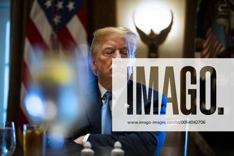 U.S. President Donald Trump listens during a lunch meeting with Republican lawmakers in the Cabinet Room at the White House in Washington, D.C. on Tuesday, June 26, 2018. From left: Representative Robert Aderholt, a Republican from Alabama, Senator Richard Shelby, a Republican from Alabama, Trump, Representative Rodney Frelinghuysen, a Republican from New Jersey, and Senator Lisa Murkowski, a Republican from Alaska. WAX20180626154 AlxDrago