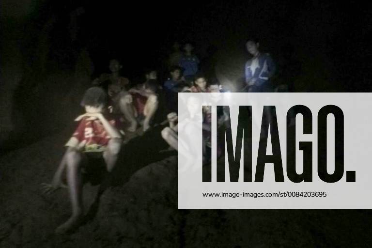 (180703) -- CHIANG RAI (THAILAND), July 3, 2018 () -- Photo provided by Thai Navy Seal shows trapped teenagers in a cave in Mae Sai, Chiang Rai province, northern Thailand, on July 2, 2018. Twelve teenagers and their football coach, trapped in a cave in northern Thailand for nine days, have been found alive on Monday night, Narongsak Osottanakorn, governor of Chiang Rai province said. () THAILAND-CHIANG RAI-MISSING FOOTBALLERS-RESCUE Xinhua