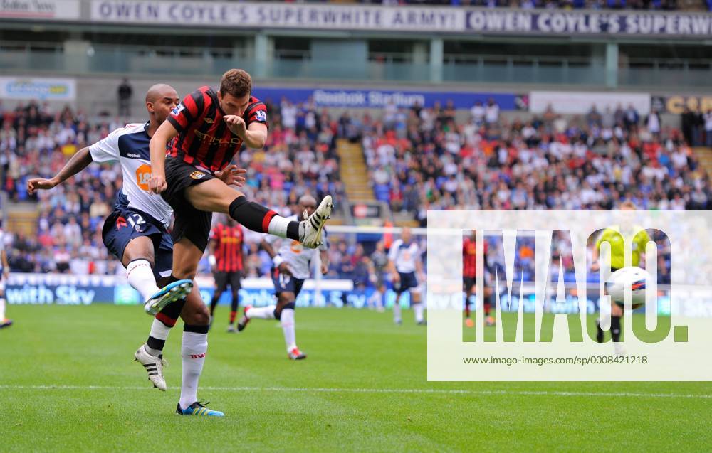 Edin Dzeko of Manchester City scores the third goal Barclays Premier League. Bolton Wanderers vs Manchester City. 21st August, 2011 .