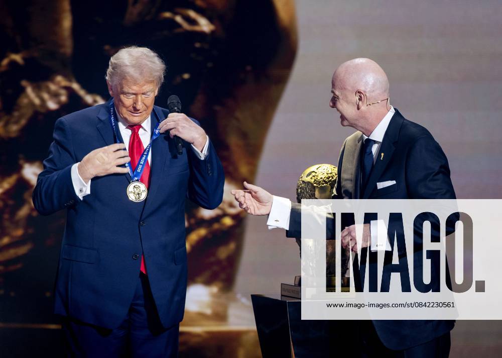 WASHINGTON - President Donald Trump receives the FIFA Peace Prize from FIFA President Gianni Infantino during the draw for the 2026 World Cup in the United States. ANP KOEN VAN WEEL netherlands out - belgium out