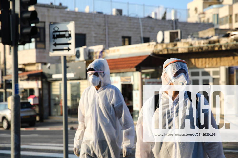 Coronavirus precautions in Jerusalem JERUSALEM - MARCH 16: Officials carry out disinfection works as a precaution against the coronavirus (COVID-19) at a tram station in Shuafat district in Jerusalem on March 16, 2020. Kudüs Palestinian Territory, Occupied. Editorial use only. Please get in touch for any other usage.