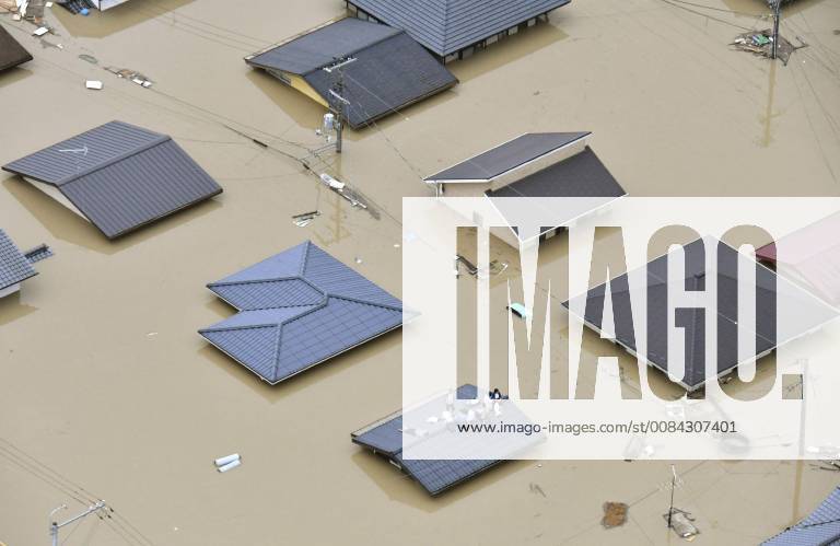 Torrential rains Photo taken from a Kyodo News helicopter on July 7, 2018 shows a residential area of Kurashiki, Okayama Prefecture, where homes are submerged following torrential rains that hit a wide area of western Japan.