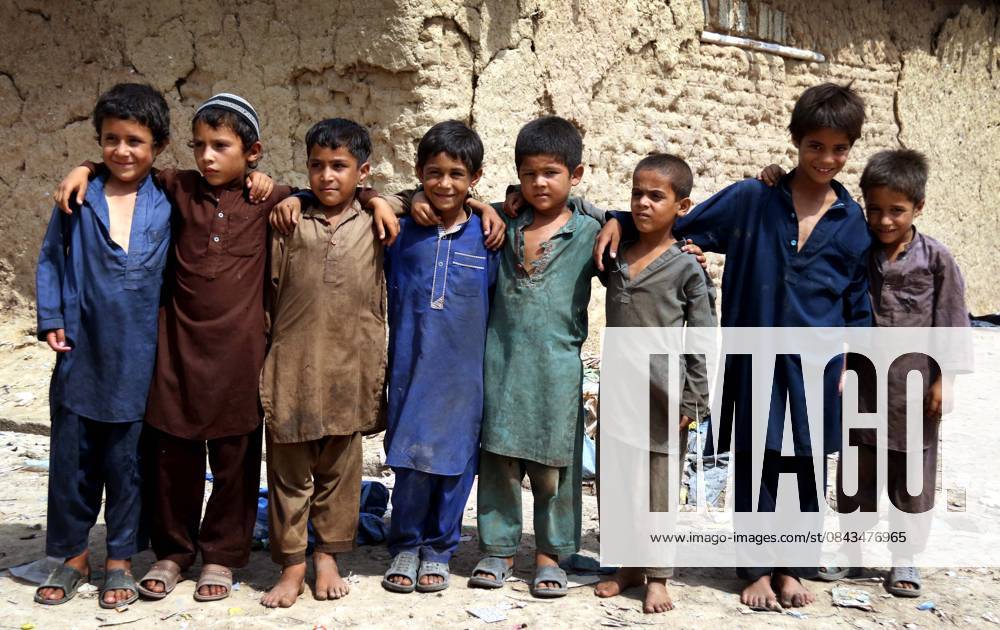 Afghan refugees in Pakistan ISLAMABAD, PAKISTAN - JUNE 19: Afghan refugee children pose for a photograph at a refugee camp in a slum dwelling neighborhood on the outskirts of Islamabad, Pakistan, on June 19, 2017, on the eve of the World Refugee Day. Islamabad Pakistan. Editorial use only. Please get in touch for any other usage.