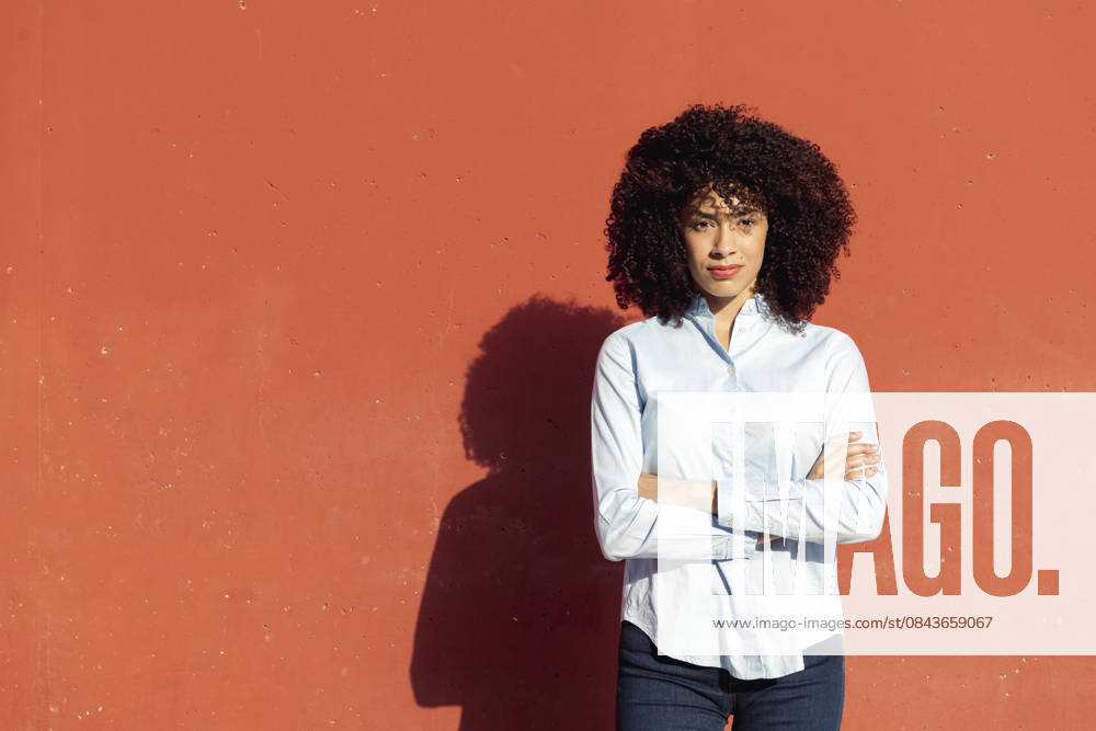 Female entrepreneur standing with arms crossed serious ethnic female entrepreneur wearing formal shirt standing with arms crossed looking at camera, model released, , 61998890.jpg RECORD DATE NOT STATED