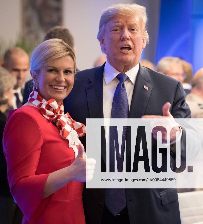 Croatia President Kolinda Grabar-Kitarovic and US President Donald Trump pictured ahead of a dinner at the Parc du Cinquantenaire - Jubelpark park in Brussels, for the participants of a NATO (North Atlantic Treaty Organization) summit, Wednesday 11 July 2018. BENOITxDOPPAGNE 05383773
