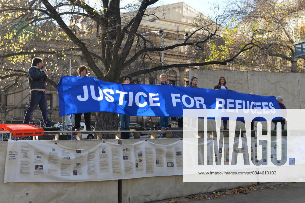 World Refugee Day in Melbourne MELBOURNE, AUSTRALIA - JUNE 21: People hold banners as they gather to mark World Refugee Day in Melbourne, Australia on June 21, 2015. Queensland Australia. Editorial use only. Please get in touch for any other usage.