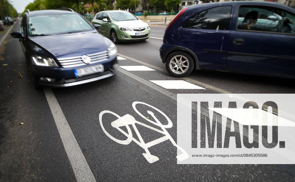 Bicycle track in Bucharest Bucharest, Romania - August 12, 2020: A car is wrong driven on a bicycle track on a boulevard in Bucharest. Bucharest Romania