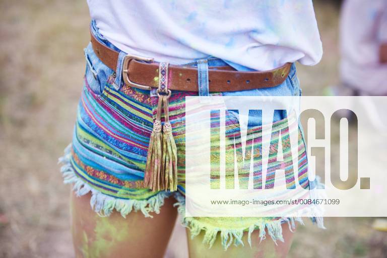 Woman s legs with holi colors model released Symbolfoto ABIF00622