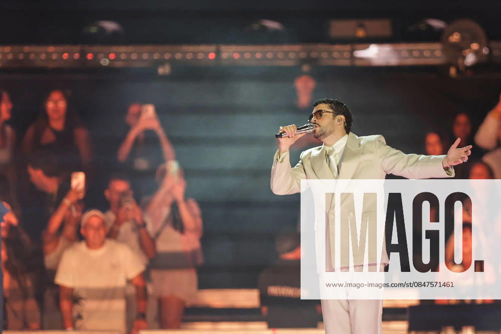 Bad Bunny performs first Buenos Aires concert of world tour BUENOS AIRES, ARGENTINA - FEBRUARY 13: Puerto Rican singer Bad Bunny performs during the first of his three scheduled shows at Estadio Monumental in Buenos Aires, Argentina, as part of his Debi Tirar Mas Fotos world tour, in Buenos Aires, Argentina on February 13, 2026. The artist arrived in Argentina following a high-profile appearance at the Super Bowl, where he delivered strong criticism of US policies, and after winning a Grammy Award, becoming the first Spanish-language album to receive the Album of the Year honor. The concert drew tens of thousands of fans, marking one of the most anticipated musical events of the year in the Argentine capital. Luciano Gonzalez Anadolu Bu