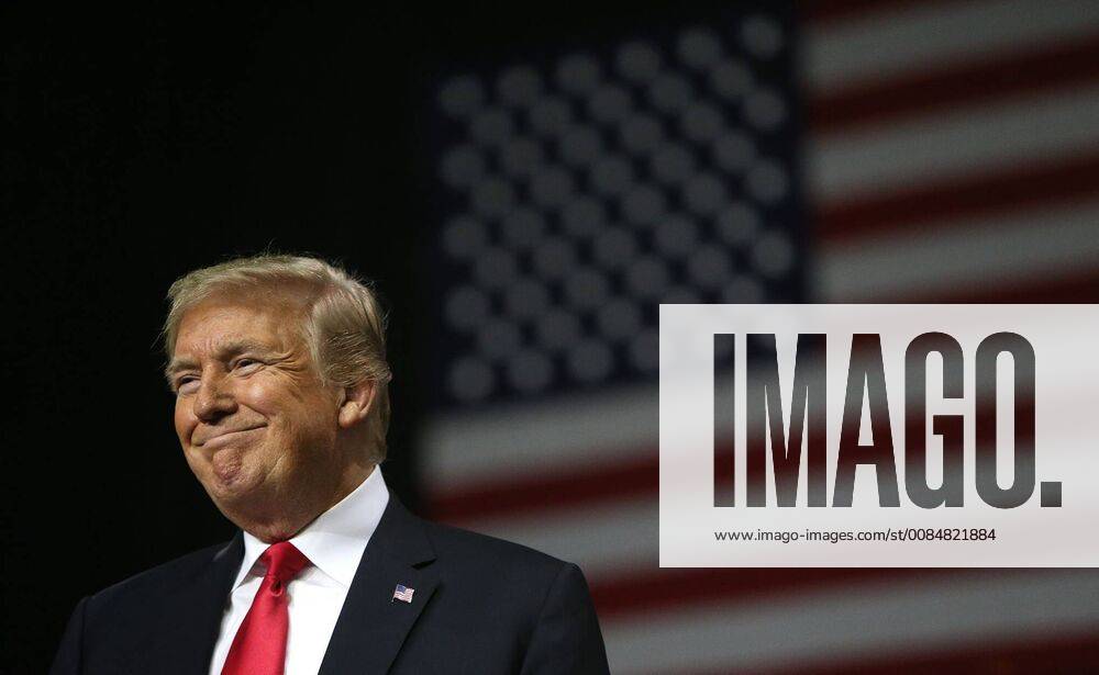 Tampa, Florida, U.S. - JAMES BORCHUCK Times.Donald Trump takes the stage during a MAGA rally at the Florida State Fairgrounds Tuesday, July 31, 2018. Tampa U.S. - ZUMAs70_ 20180731_zan_s70_135